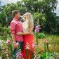 Engaged Couple in Field of Flowers